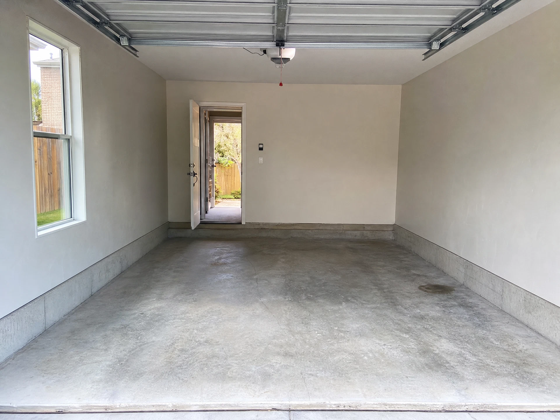 Residential garage after rubbish removal, cleared and tidy